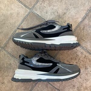 Black, white and gray sneakers